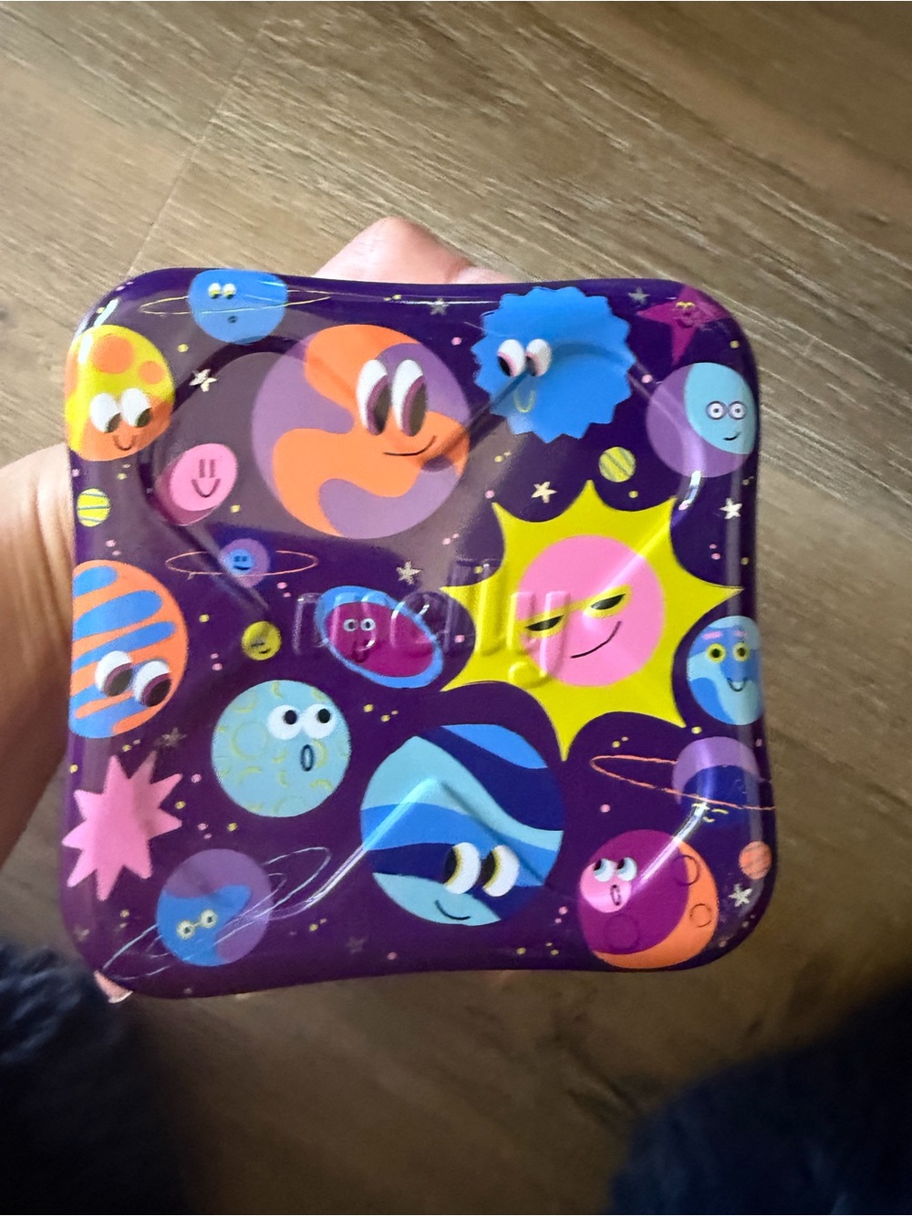 Empty welly bandaid container with planets space solar system EUC